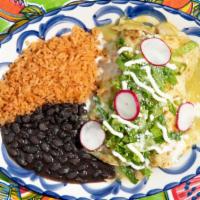 Enchiladas Suizas · Chicken, chihuahua cheese, Chile sauce, crema, rice and beans.
