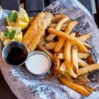 Fish And Chips · Beer battered catfish, coleslaw, house cut fries, and tartar sauce.