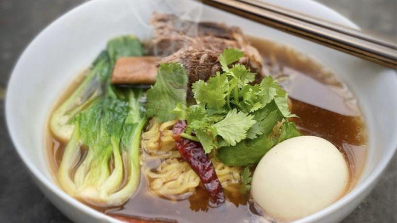 Short Rib Ramen · Braised short rib in a rich five spices veal stock, egg noodles, boiled egg, bok choy, shiitake, celery, and chili.