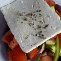 Village Salad / Horiatiki Loi · Tomato, Cucumber, Pepper, Onion, Kalamata Olives, Feta, Olive Oil