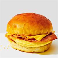 The New Yorker · The classic New York breakfast sandwich! Crispy bacon, egg and American cheese, served warm ...