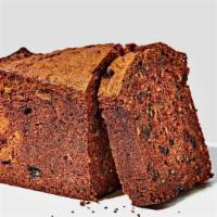 Carrot Raisin Pound Cake · This pound cake is rich and perfectly moist.  We combine freshly shaved carrots, diced honey...