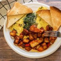 Spinach, Mushroom, Onion, And Cheddar Omelette · 3 eggs omelette served with home fries and toast.