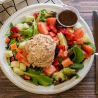 Tuna Salad Platter · Light tuna, diced tomatoes cucumbers served over mixed greens and our homemade balsamic dres...