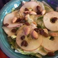 Apple Salad · Delicious red apples, pecans, and goat cheese served over romaine lettuce with our homemade ...