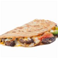 Beef Fajita Quesadilla · Grilled beef fajitas with bell peppers, onions, tomatoes and topped with shredded cheese.