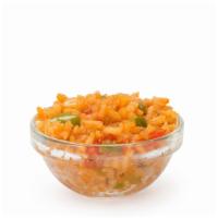 Mexican Rice · Rice seasoned with authentic spices and cooked with diced onions, peppers and tomatoes.