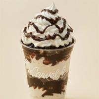 Oreo® Cookie Sundae Dasher® · Layers of Oreo® cookies, vanilla ice cream and fudge topped with whipped cream.