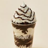Fudge Brownie Sundae Dasher® · Layers of fudge brownie bites, vanilla ice cream and hot fudge topped with whipped cream.