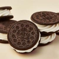 Oreo®  Rounders (6-Pack) · Soft serve vanilla ice cream sandwiched between two  OREO® cookies.
