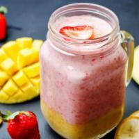 Sweet Treo Smoothie · Delicious, Sweet Smoothie prepared with pineapple, strawberry, mango, honey, and apple juice.