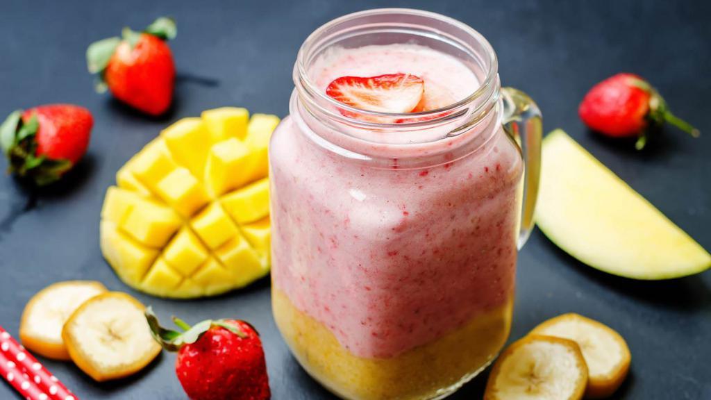 Sweet Treo Smoothie · Delicious, Sweet Smoothie prepared with pineapple, strawberry, mango, honey, and apple juice.