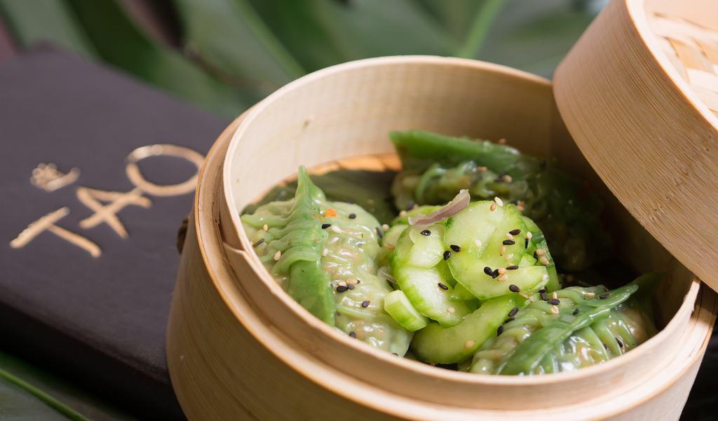 Bamboo Steamed Vegetable Dumplings · Root Vegetables, Shiitake Mushrooms, Spicy Soy Dipping Sauce. Vegan.