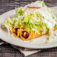 Flautas · Crispy tacos Order of 3. Hard shell tacos topped with lettuce, shredded cheese, and sour cream