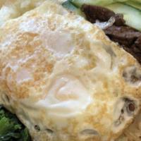 Bibimbap · Served with rice, mac and vegetables or tossed salad.