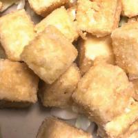 Fried Tofu · Tofu battered lightly and fried until crisp.