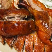 Roast Duck (Half) · half of house roasted seasoned duck.