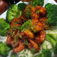 Volcano Shrimp · Lightly battered, fried shrimp, wok-tossed in spicy garlic sweet, and sour tomato sauce.