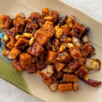 Kung Pao Tofu · Fried tofu, onions, peanuts in  kung pao spicy sauce