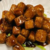 Orange Tofu · Lightly fried tofu and wok-tossed in house-made orange sauce.