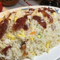 Chinese Sausage Fried Rice · Rice, peas, carrots, egg, onion, lap cheong (Sweet Chinese sausage), stir-fried, and seasone...
