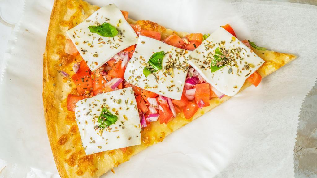 Caprese Pizza · Chopped tomatoes, onions, fresh mozzarella & basil.
