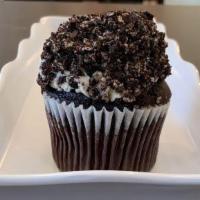 Cookies & Cream Cupcakes · Chocolate Cupcake, Chocolate Buttercream topped with Oreo.