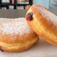 Jelly Donuts · an everyday staple... filled with our delicious raspberry filling