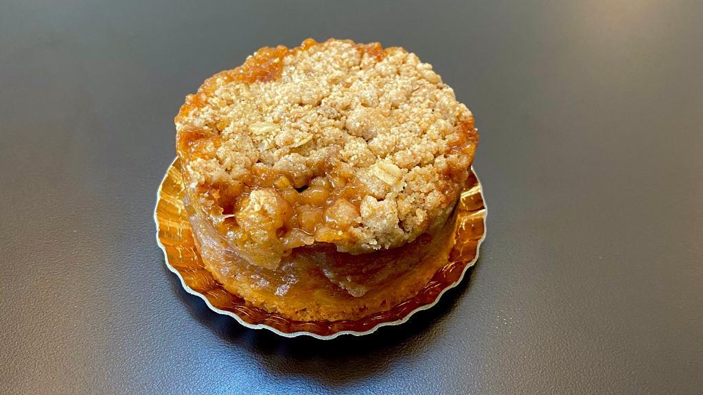 Apple · Caramelized apples, cinnamon crust topped with oatmeal crumbs.