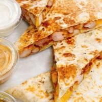 Quesadilla · On XL flour tortilla with lots of Monterey Jack cheese, toasted on hot griddle, served with ...