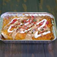 Enchiladas · Rolled in hot corn tortillas with your choice of protein and Monterrey cheese, layered with ...