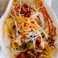 Basic Taco · Simple, lettuce, cheese and salsa fresca with your choice of protein served on a hot flour t...
