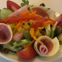 Cold Antipasto · Mixed greens, tomatoes, olives, roasted peppers, ham, salami & provolone