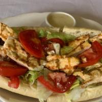 Cold Grilled Chicken · Cold grilled chicken cutlet with lettuce and tomato with a side of dressing
