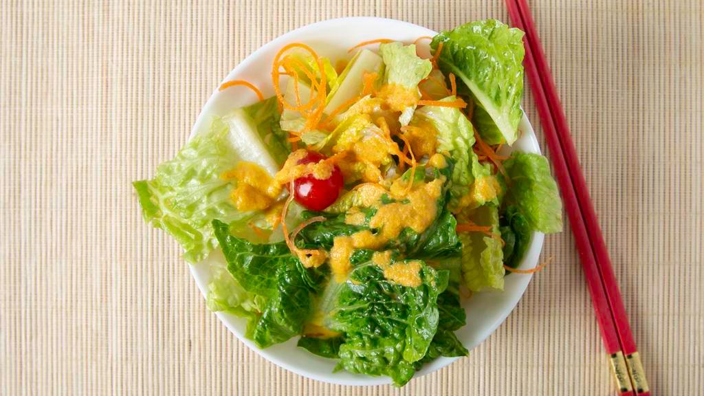Field Green Salad · With ginger dressing.