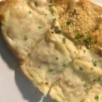Garlic Bread Parmigiana · Toasted bread with garlic and melted mozzarella cheese.