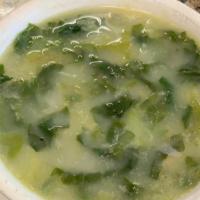 Escarole & Beans Soup · Leafy Escarole Cabbage and White Beans with Garlic.