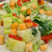 Caesar Salad · Romaine, croutons, roasted red peppers and Parmesan cheese with Caesar dressing.