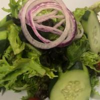 House Salad · Mixed field greens, cherry tomatoes, cucumbers, red onions and olives with a balsamic vinaig...
