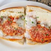 Chicken Parmigiana Hero · Breaded chicken cutlet with marinara sauce and melted mozzarella cheese on a toasted hero.