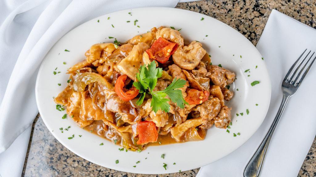 Chicken Scarpariello · Sautéed chicken with hot and, or sweet vinegar peppers, sausage and sliced potatoes in a garlic lemon white wine sauce.