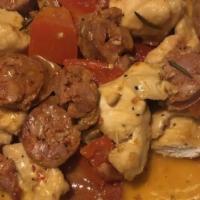 Chicken Scarpariello · Off-the-bone chicken, sweet and spicy sausage, sliced potatoes, cherry and vinegar peppers a...