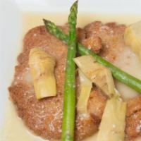 Veal Martini · Parmesan crusted veal with artichoke hearts and asparagus in lemon butter sauce.