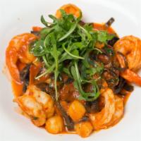 Squid Ink Pasta · With shrimp, bay scallops, chiles and arugula.