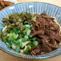 Noodle With Beef Sauce (No Soup)牛滷肉乾拌麵 · Chop beef brisket and then cooked slowly in a closed pan with a dry noodle .(no soup)
