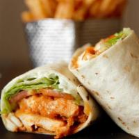 Buffalo Chicken Wrap · Crispy chicken, Buffalo sauce, lettuce, tomato and ranch and served with fries.