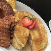 Bagel Land Pancake Special · 2 pancakes bacon sausage or ham and 2 scrambled eggs.