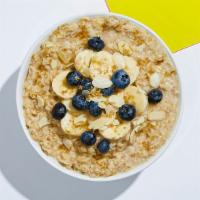 Blueberry Banana Oatmeal · Warm rolled oats with banana, blueberries, and almonds.