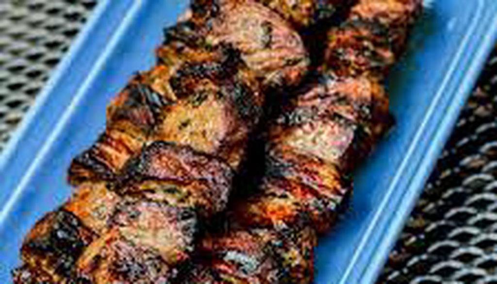 Grilled Steak Kebabs (Pincho De Bistec) · Each stick or kebabs brings 4-5 pieces of steak.