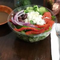 Greek Salad. · Romaine lettuce, tomatoes, cucumbers, green peppers, onions, olives, feta cheese . Dressing ...